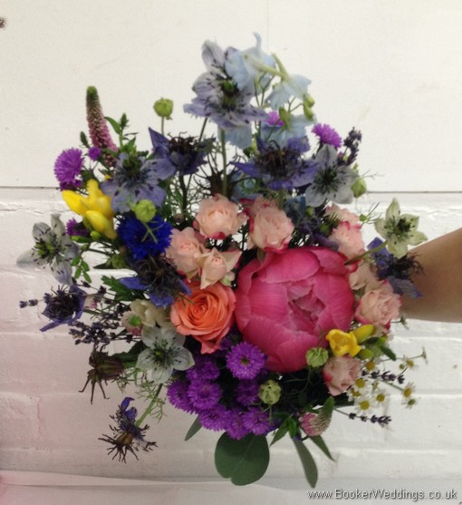 Rustic just picked Bridesmaid bouquet with Asters, Freesias, Peonies, Delphinium, Nigela, Stocks, Cornflowers, Spray Roses, Veronica, Lavender and Foliage