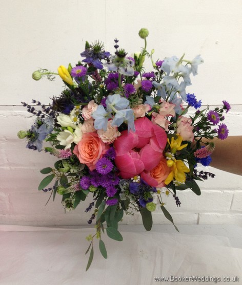 Wild just picked country bridal bouquet with Asters, Freesias, Peonies, Delphinium, Nigela, Stocks, Cornflowers, Spray Roses, Veronica, Lavender and Foliage