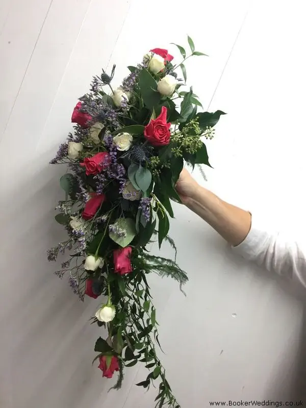 Bride Shower of Roses Spray Roses Limoneum Eryngium