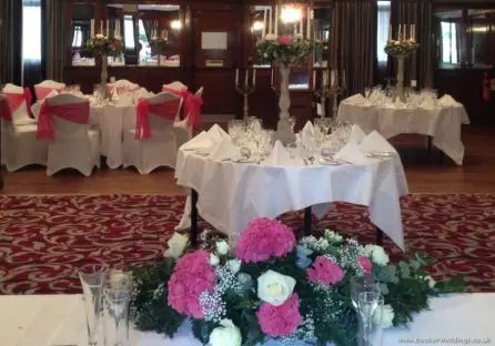 Cerise Hydrangea and White Rose Top Table and Candelabra Centrepieces at The Alicia Hotel