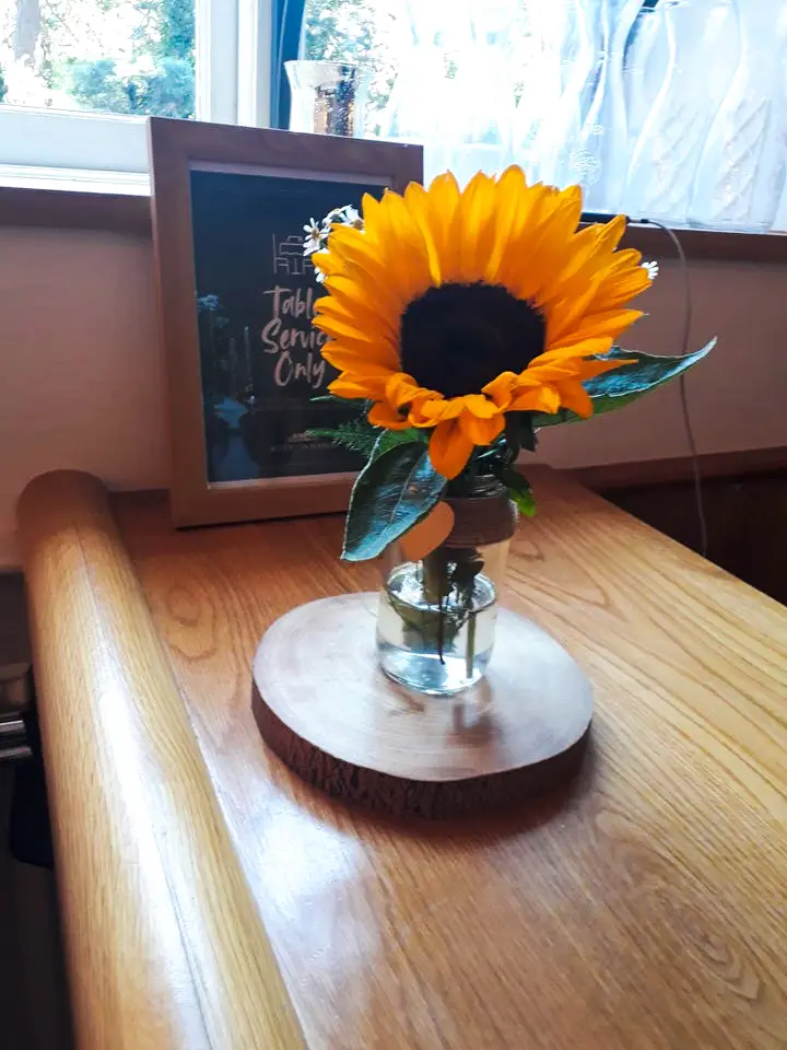 Sunflowers and Log Slice Table Centerpiece