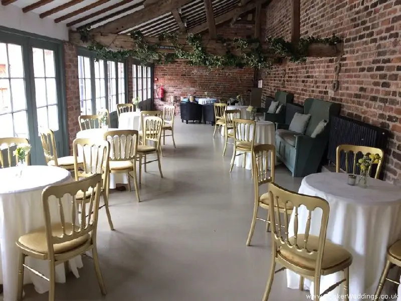 Meols Hall, venue flowers in glass jars for table centerpieces