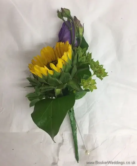 Grooms Buttonhole with Yellow Gerbera and purple lissianthus side view