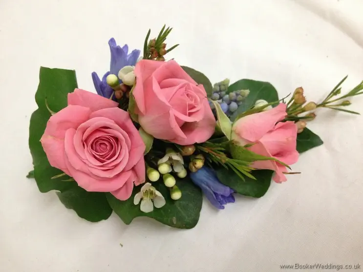 Semi Wild Wedding theme of Pale Pink, Blue and Cream Pin Corsage with Pink Spray Roses, Wax Flowers, Blue Muscari and Hyacinth