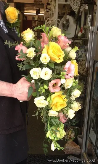 Pastel Coloured Hand tied Bridal Shower Bouquet with roses, spray roses, freesia, bouvarida and lissianthus Side View 1