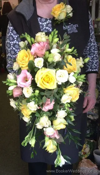 Pastel Coloured Hand tied Bridal Shower Bouquet with roses, spray roses, freesia, bouvarida and lissianthus