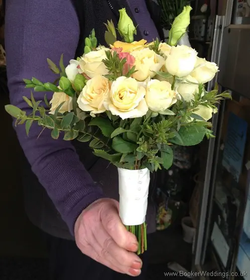 Peach, pink and yellow Wedding flowers with roses, spray roses, freesia, bouvarida and lissianthus Flower GIrl Mini Hand tied Bouquets Side View