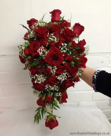 Red and White Bridal Hand Tied Teardrop shower bouquet in Red roses spray rose and gypsy grass