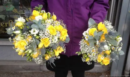 Yellow and Blue Flowers eryngium, daisy, spray rose, lisianthus and freesias Bride and Bridesmaid Bouquets